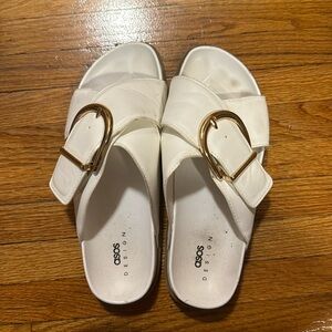 White buckle slippers